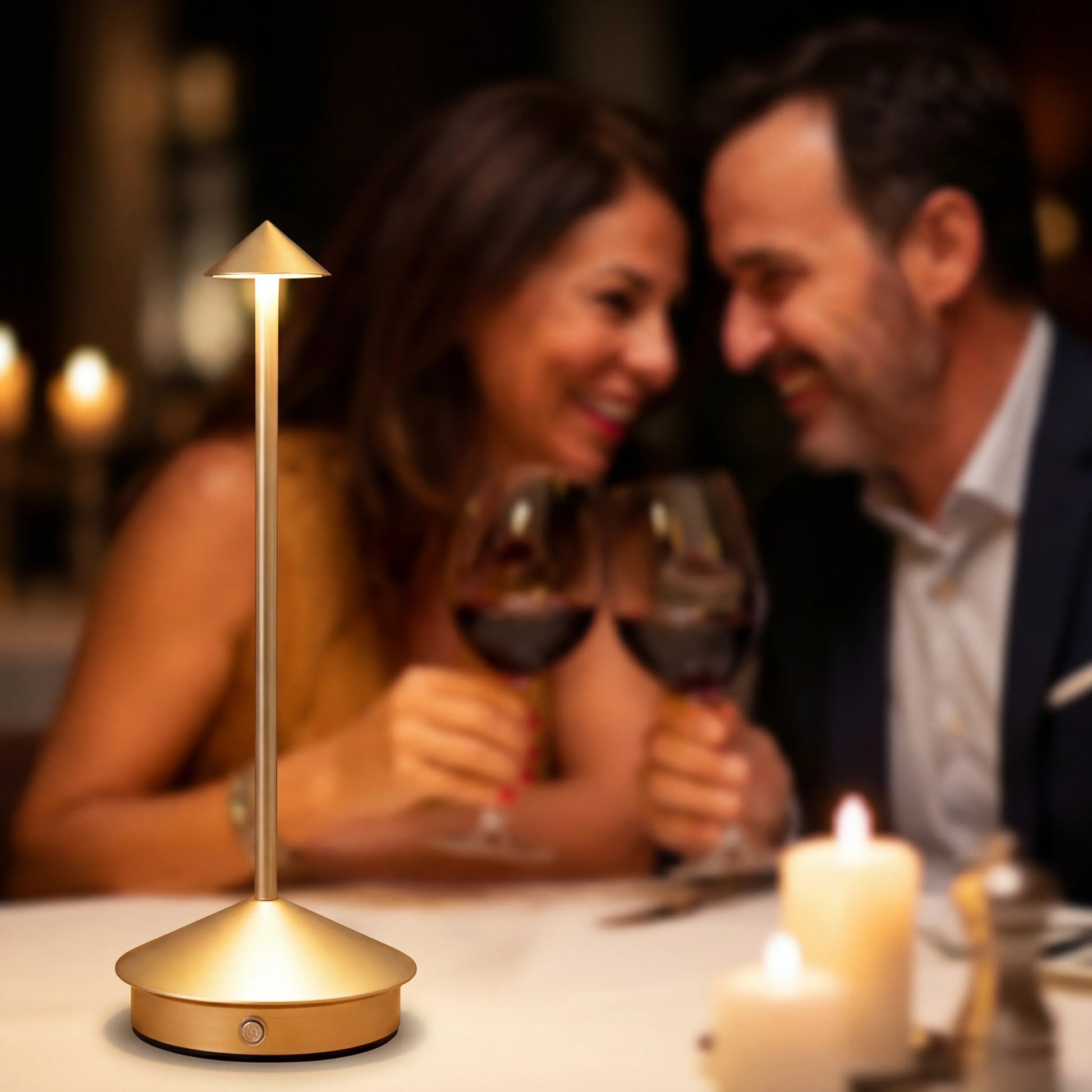 Eclara Pino cordless tabletop lamp at a romantic dinner with soft warm light