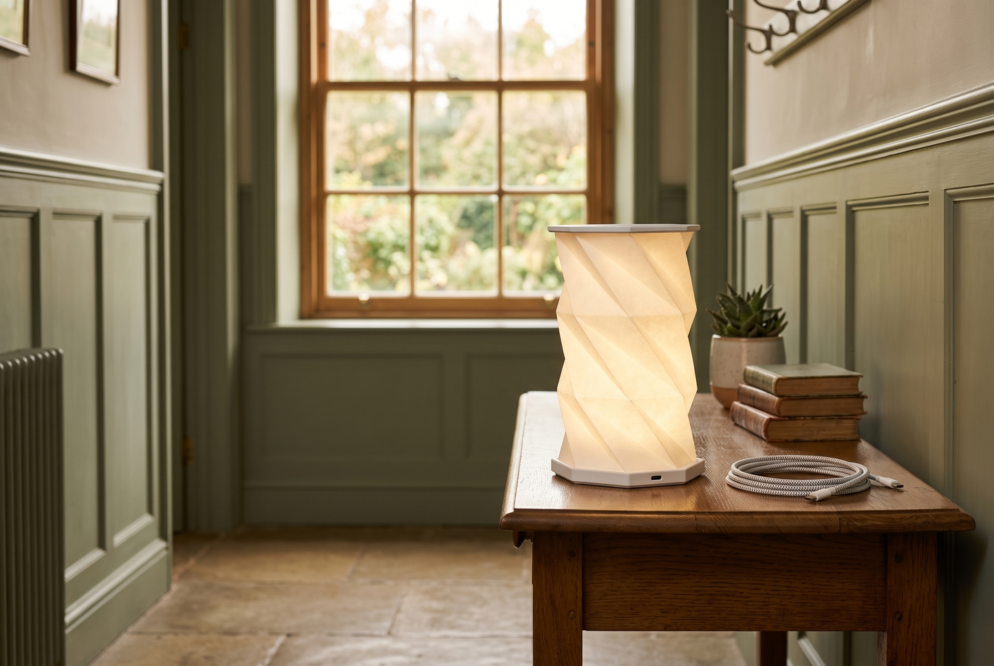 Lumina Fold lamp with its USB-C charging cable, cordless and rechargeable